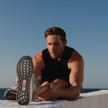 how_to_set_workout_goals how to set workout goals | man stretching