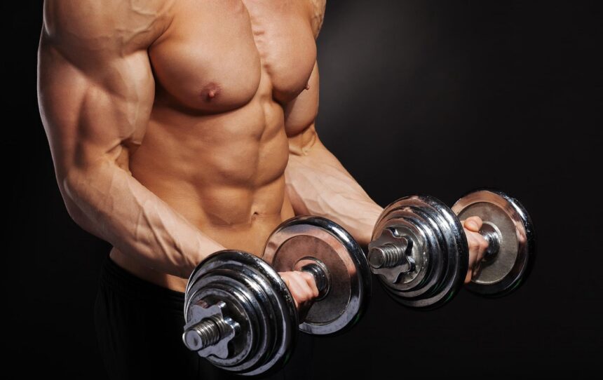 drop sets | man performing biceps curls